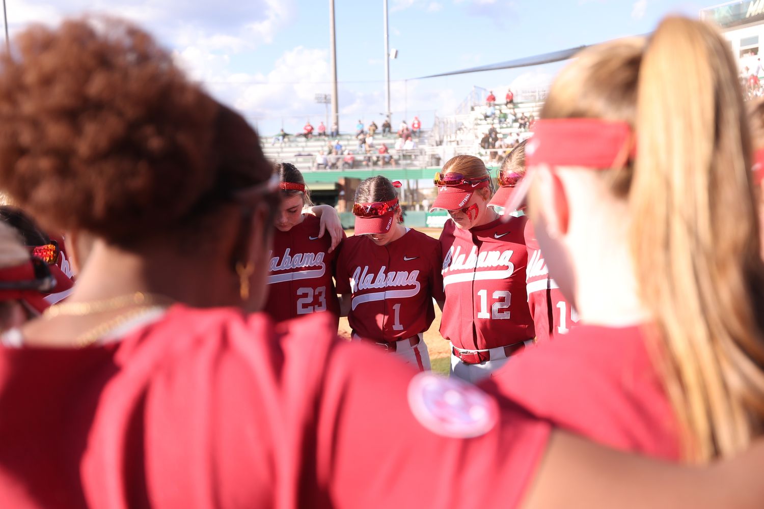 Alabama softball team huddle